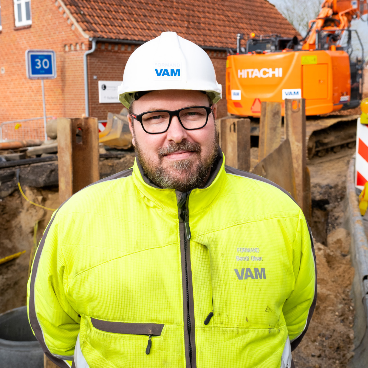 Man in front of construction