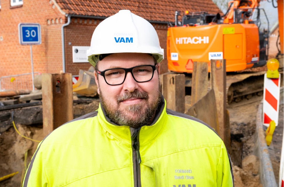 Man in front of construction